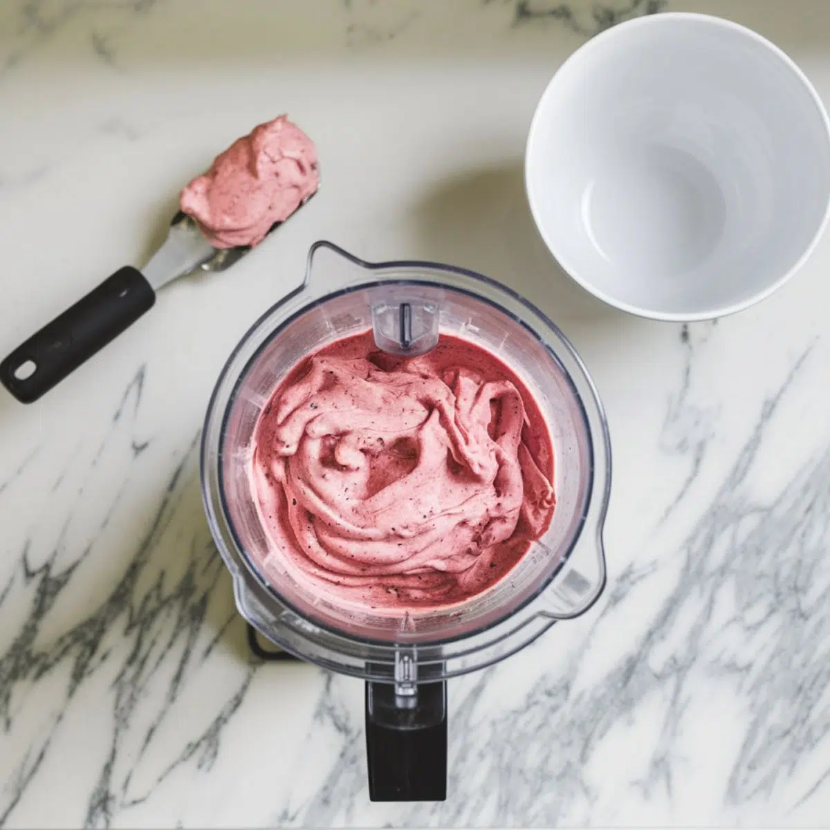 Thick smoothie bowl base resembling soft-serve ice cream, ready to transfer to a bowl.