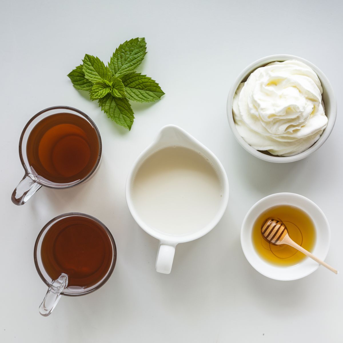 Peppermint Tea Recipe ingredients arranged on a clean kitchen contertop.