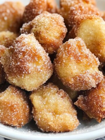Homemade Apple Fritter Bites served on a white plate