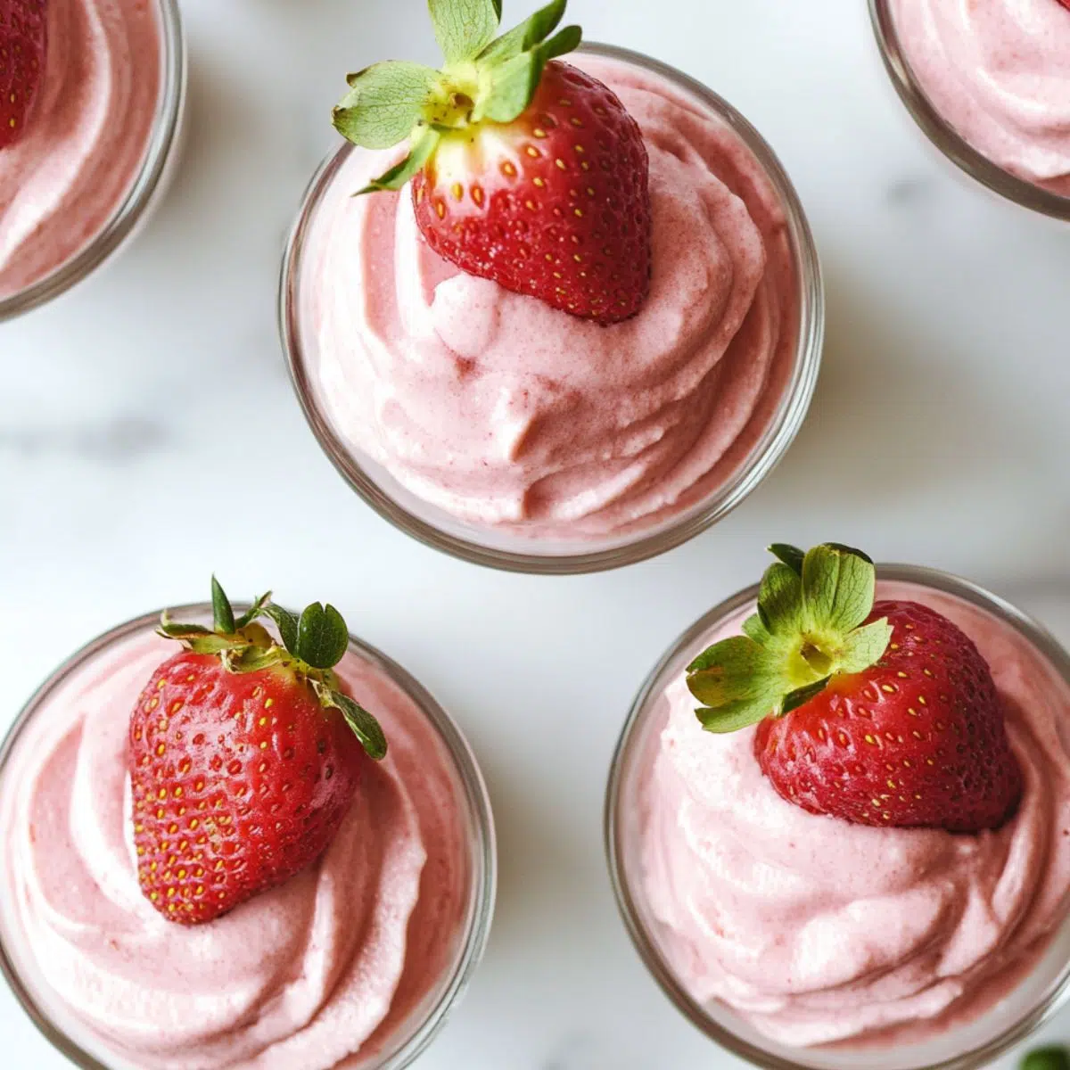 Keto strawberry mousse served in small glasses, chilled and ready
