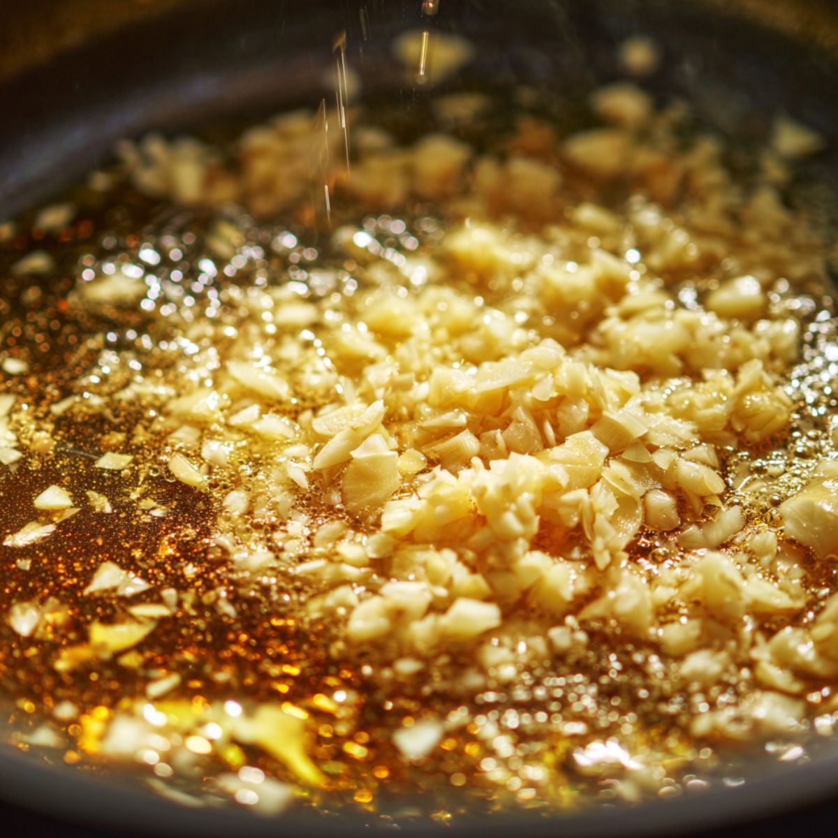 Garlic and wine simmering to build the flavor base