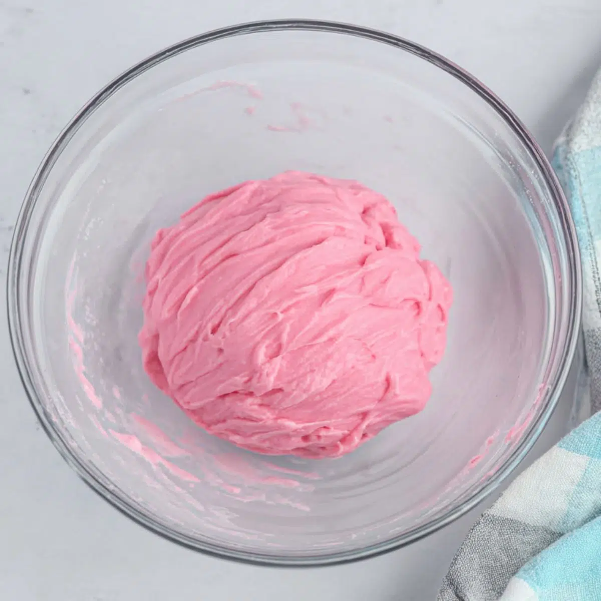  Freshly microwaved watermelon mochi dough, glossy and translucent.