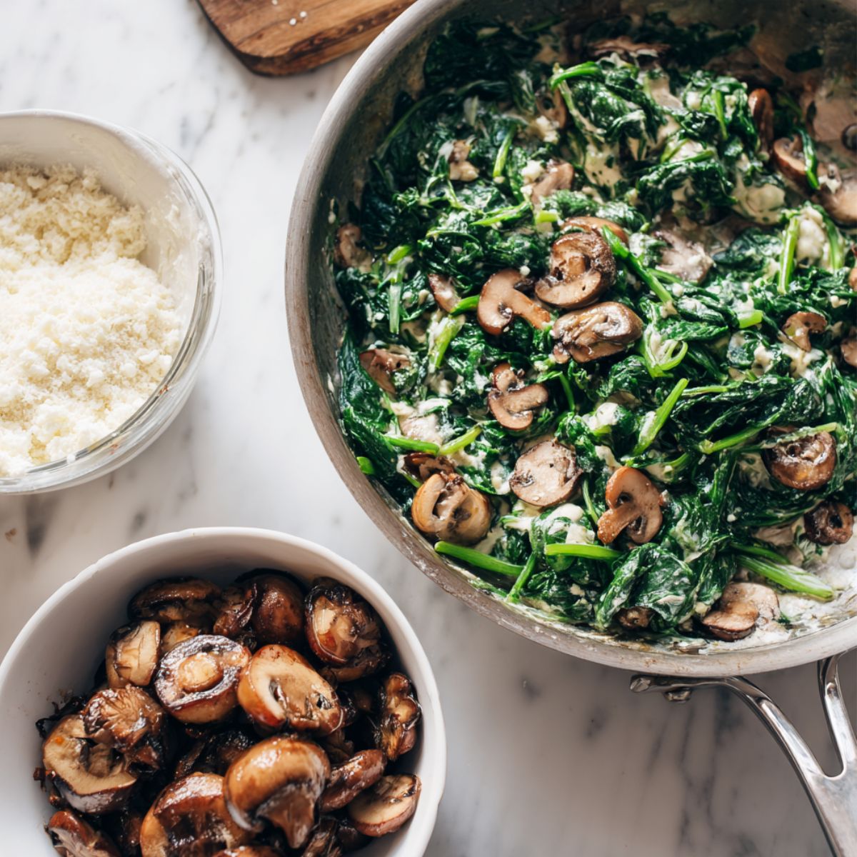 Cooking spinach, mushrooms, and preparing cheese and béchamel
