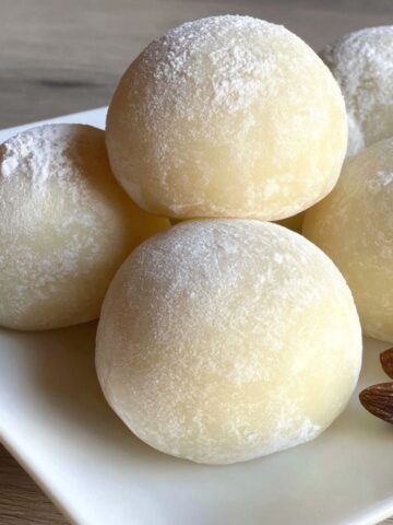 Freshly made homemade milk mochi balls on a white plate
