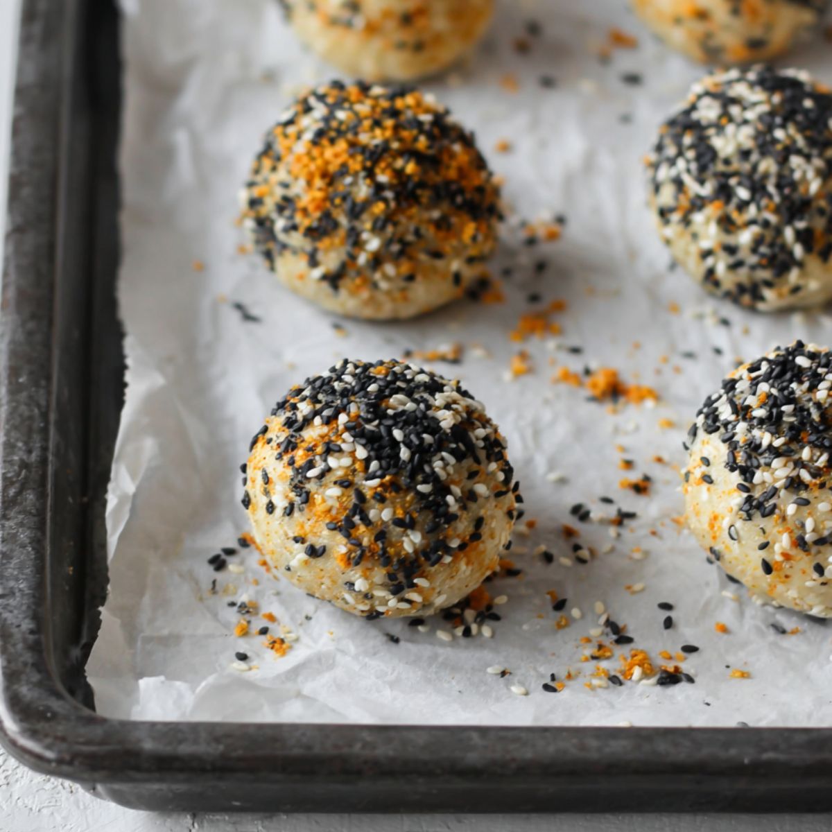 Unbaked Bagel Bites brushed with oil and seasoned