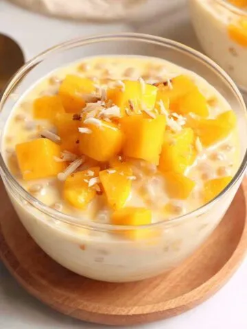 Homemade Filipino mango sago served in a glass bowl on a white kitchen counter