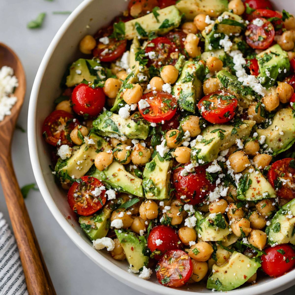 Finished Chickpea Feta Avocado Salad garnished and ready to serve