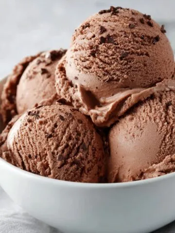 Homemade low carb cottage cheese ice cream served in a bowl on a kitchen counter