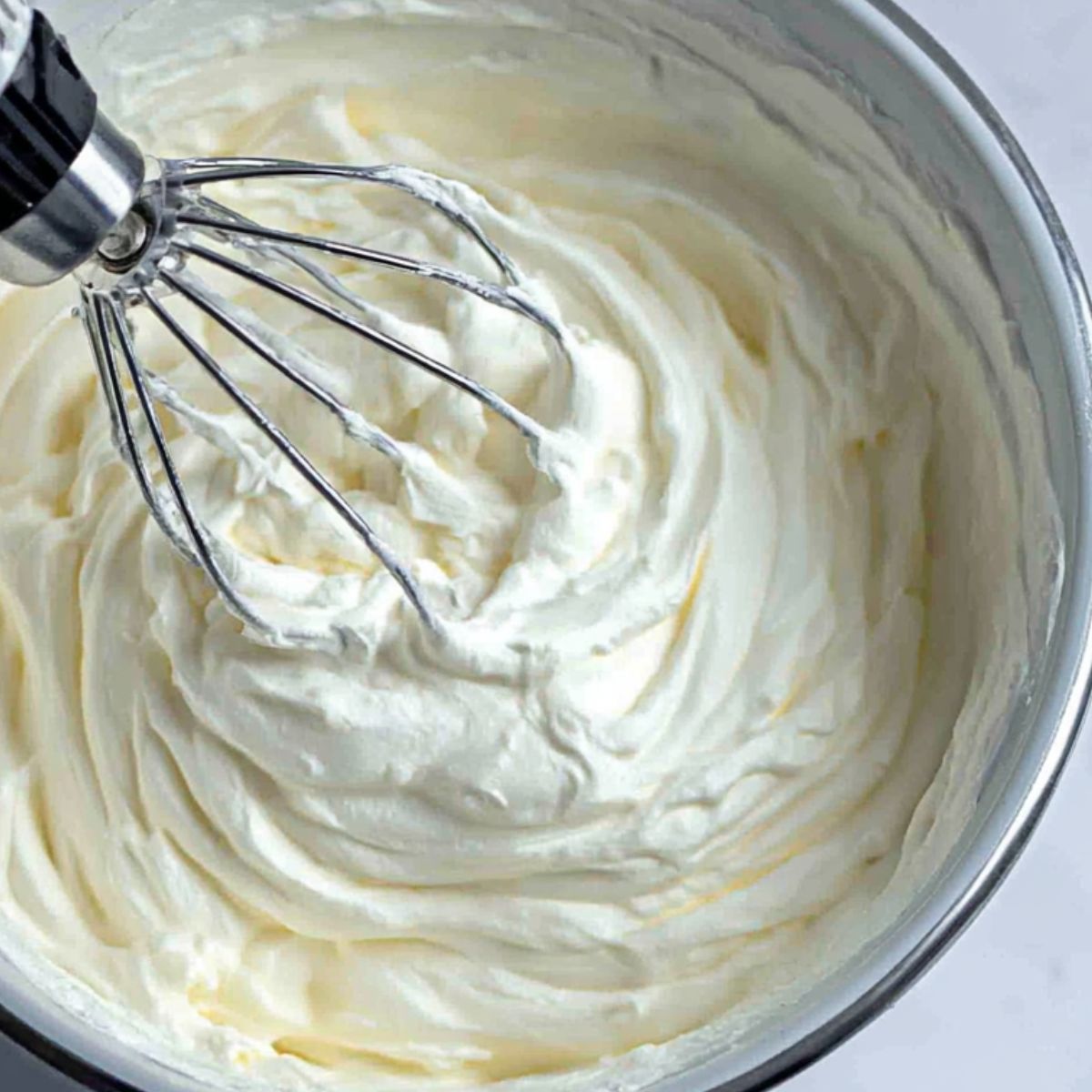 Freshly whipped cream for cake filling