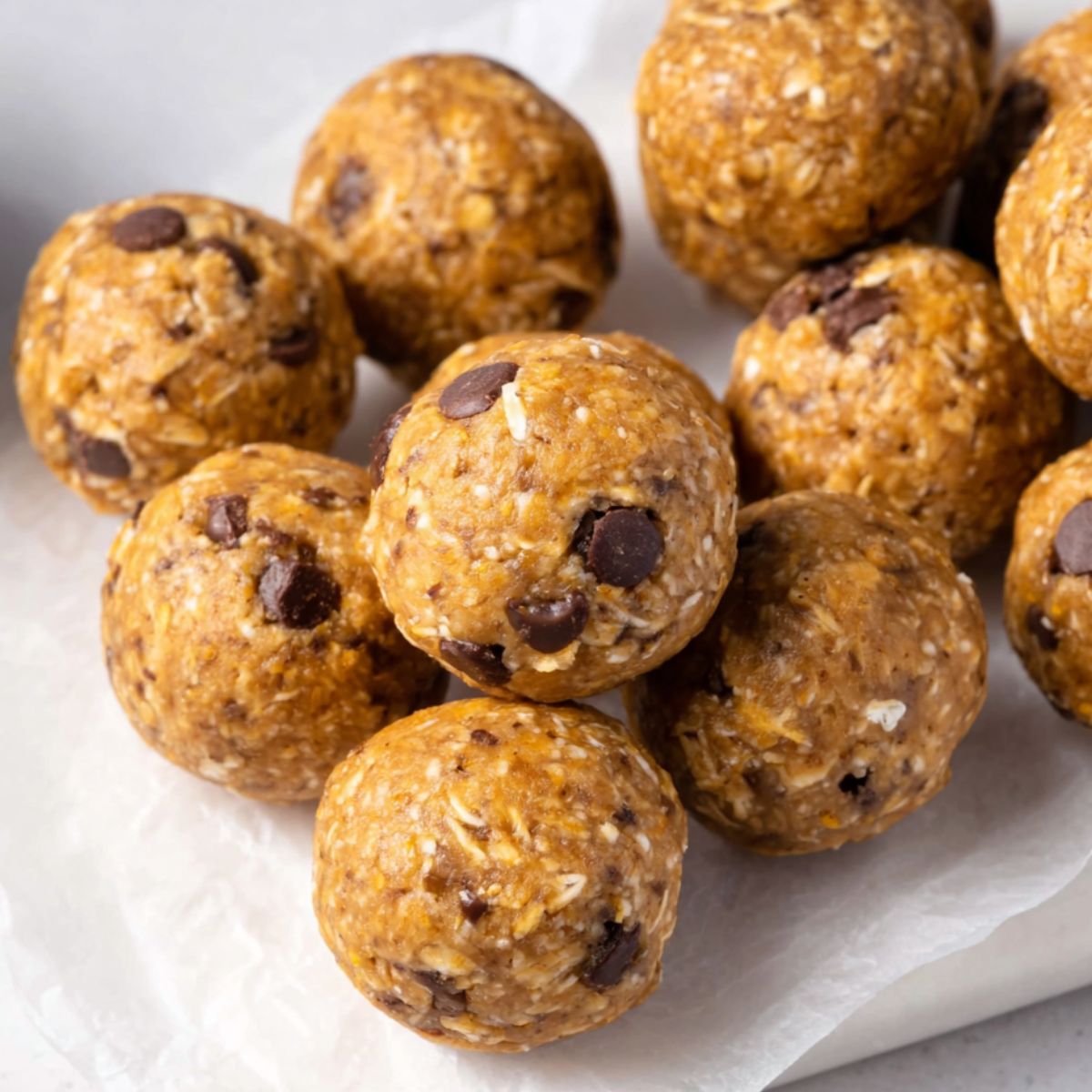  Oatmeal peanut butter protein balls stored in a container.