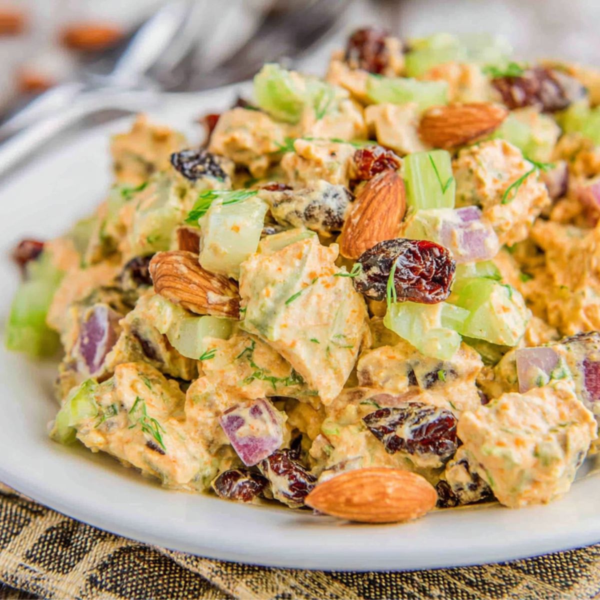 Curry Chicken Salad Recipe in a plate on a kitchen counter