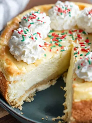 Homemade sugar cookie cheesecake on a white kitchen counter