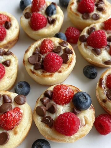 Overhead shot of homemade pancake bites on a white kitchen counter