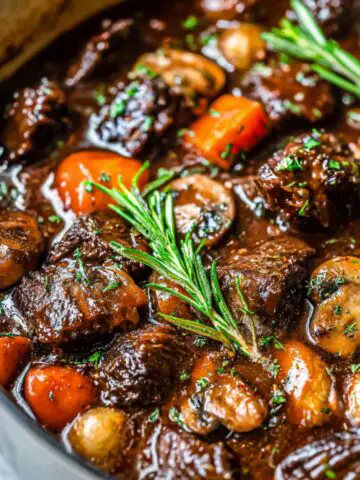 Homemade Bourguignon Beef Slow Cooker , served in a bowl on a white kitchen counter