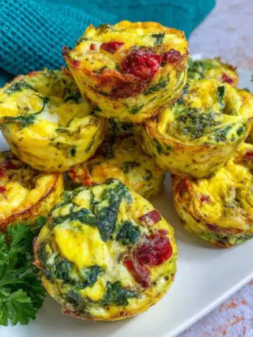 Homemade egg spinach bites on a kitchen counter